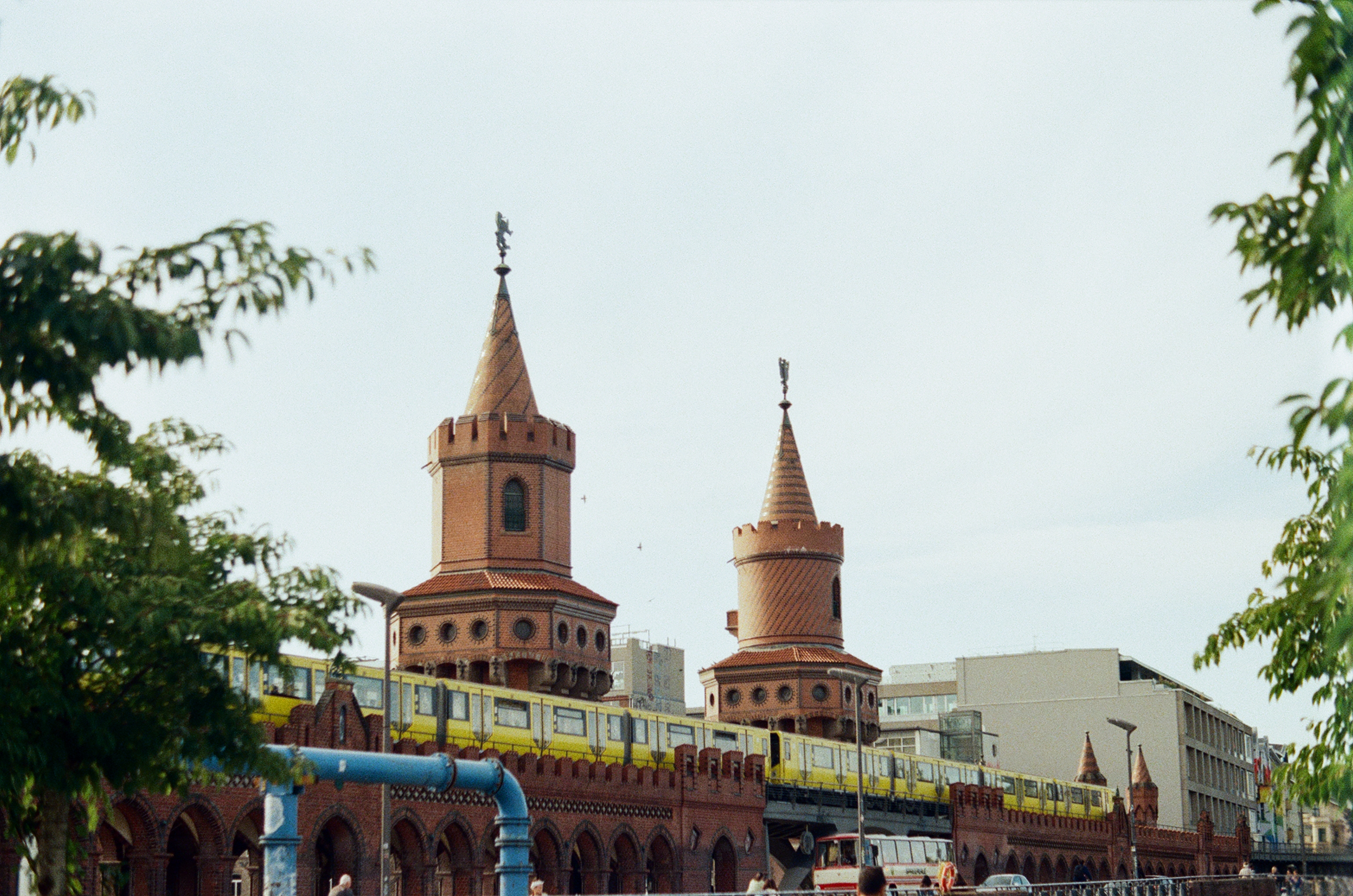 train passing in front of towers